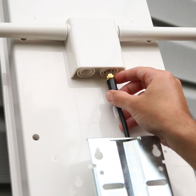 The back side of an Unlimited Antenna as it is being plugged in.